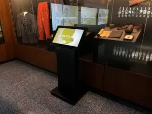 Honoring History: Exhibit Studios' Remarkable Civil War Battle Flag Exhibit Exhibit Studios touch screen on pedestal. Custom made by exhibit studios