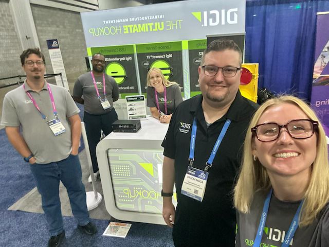 Digi team in their custom trade show exhibit