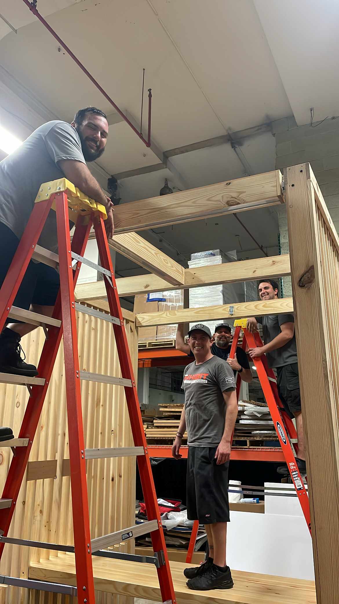 employees working on trade show exhibit