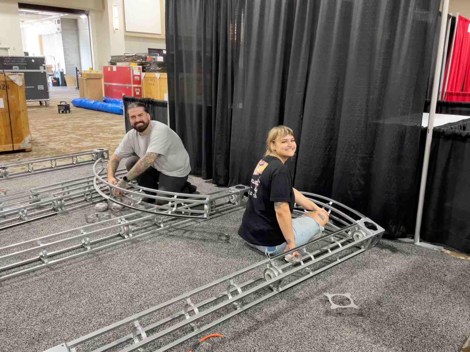 employees working on a trade show exhibit