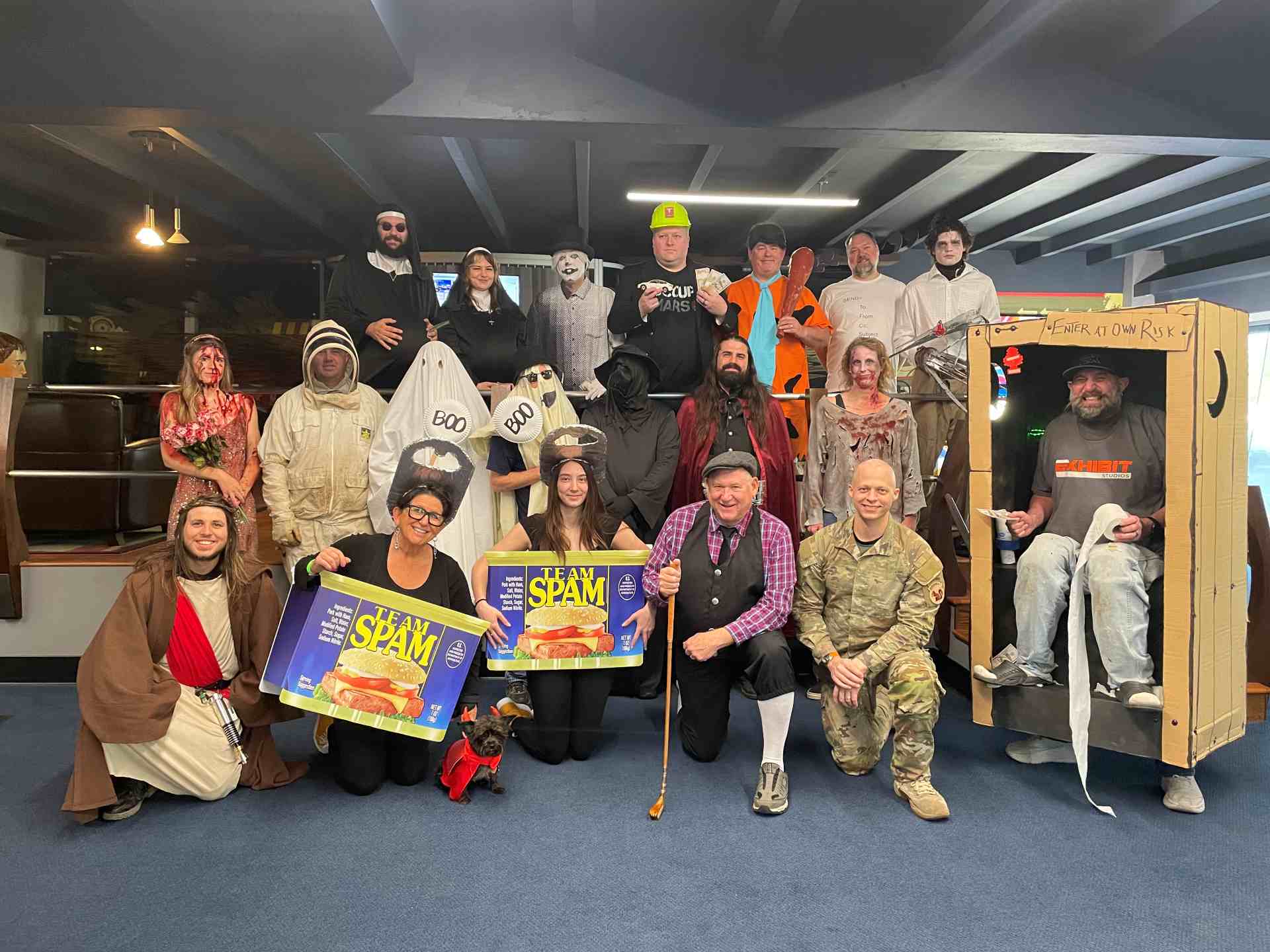 employees in Halloween costumes