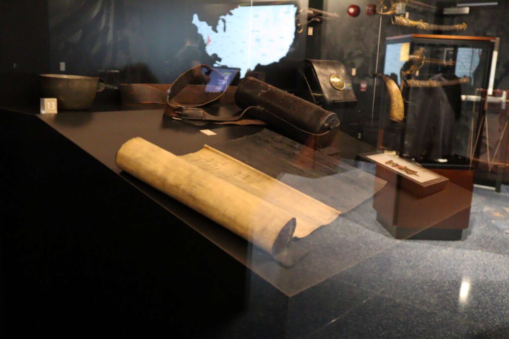 one of the glass cases of the PA Civil War Battle Flag Exhibit by Exhibit Studios
