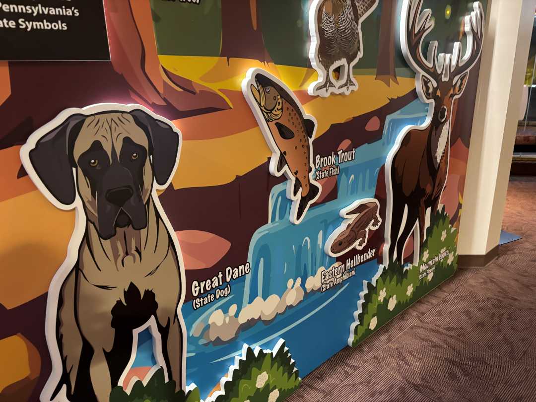 PA Capitol welcome center wall where children can take photos with it