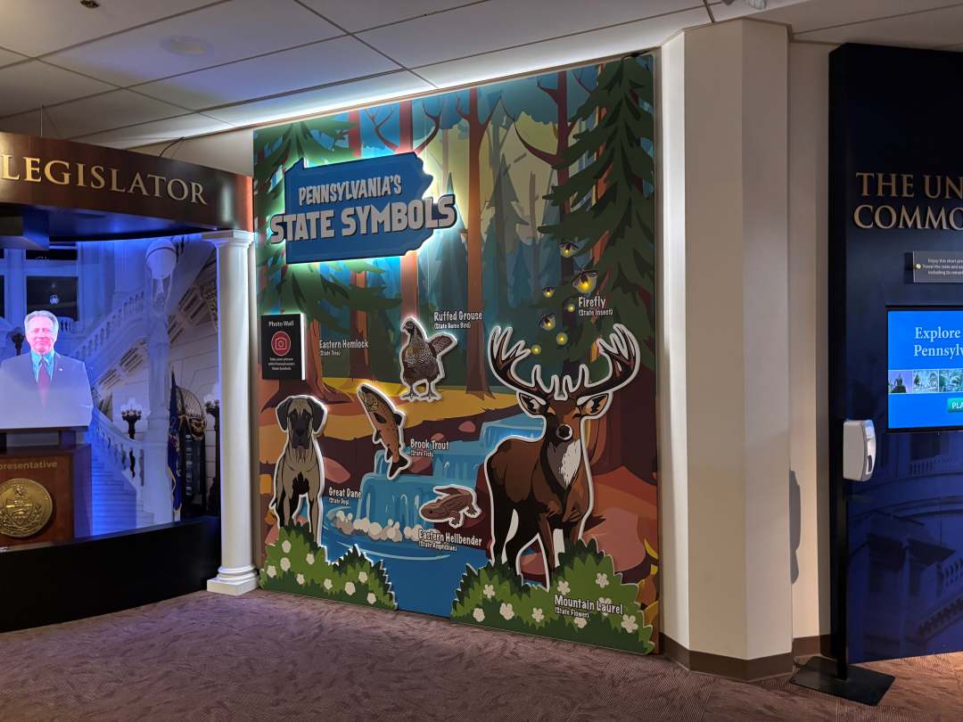 PA Capitol welcome center wall where children can take photos with it