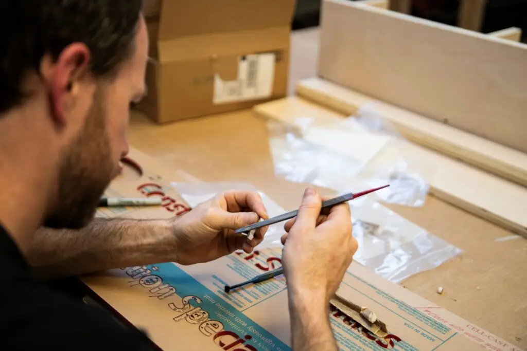 Exhibit Studios employee working on a woodshop project
