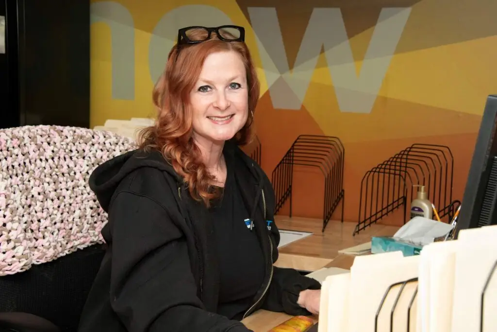Exhibit Studios employee showcasing trades how logistics